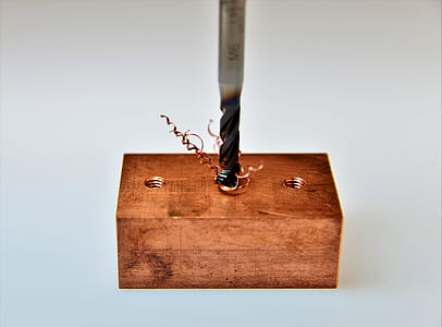 drill bit on wooden block thumbnail