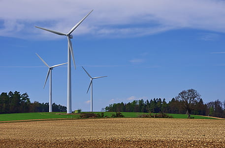 three white wind turbines thumbnail