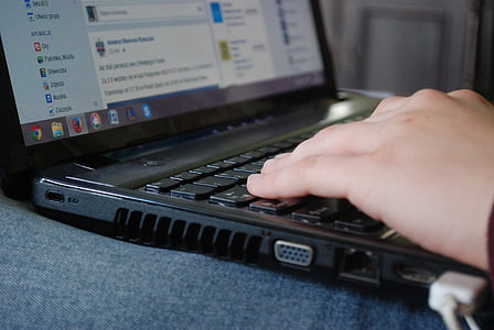 person in front of laptop computer thumbnail
