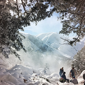 people on show covered mountain during daytime thumbnail