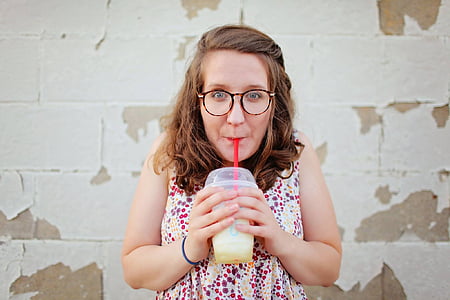 woman wearing multicolored sleeveless top thumbnail