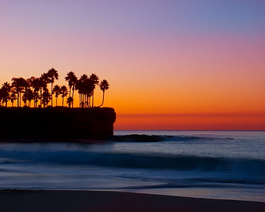 landscape photography of seashore near island thumbnail