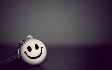 white emoticon keychain thumbnail