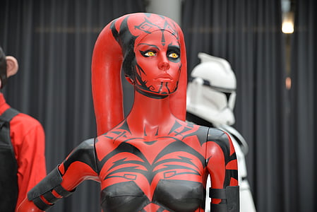 woman with white and red body paint thumbnail