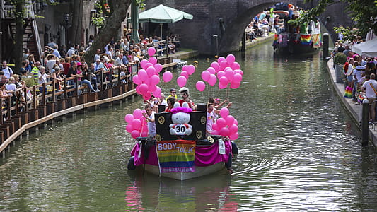 People on Boat With Pink Balloons thumbnail