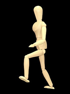 human in brown wooden figure thumbnail