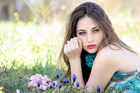 woman wearing floral tank top on grass thumbnail