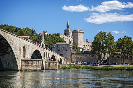 photography of brown concrete bridge during daytime thumbnail