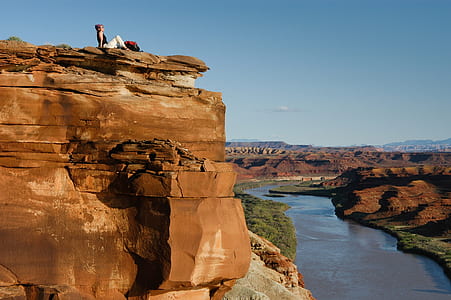 person lying on canyon thumbnail