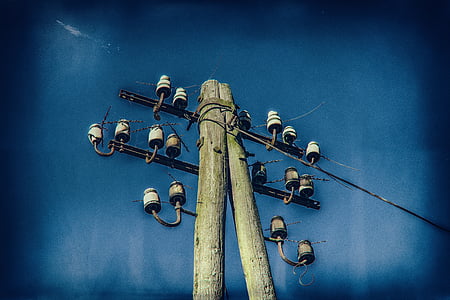 low angle photography of utility pole at daytime thumbnail