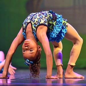 girl doing gymnastics move thumbnail