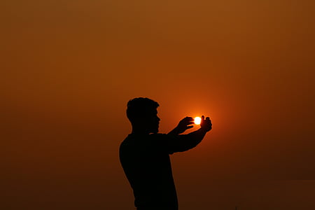 man photo during sunset thumbnail