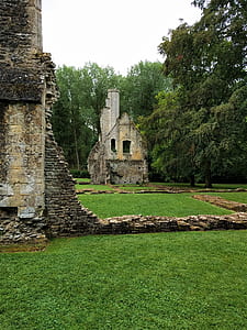 concrete building ruins near trees thumbnail
