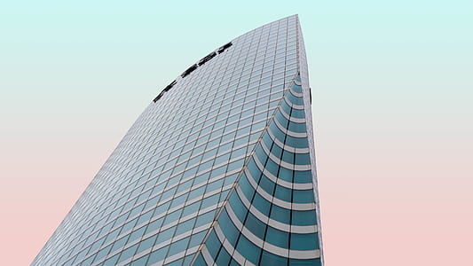 white concrete framed glass high top building thumbnail