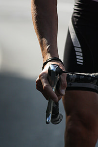 selective focus photography of man riding bicycle thumbnail