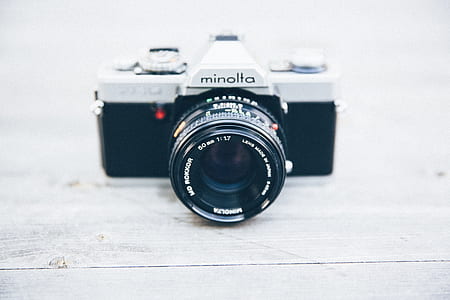 gray and black Minolta camera thumbnail