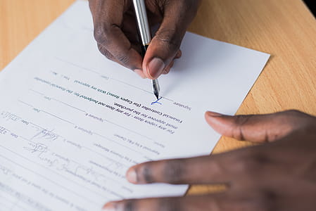 Person Signing Paper thumbnail