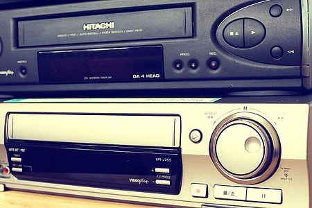 two black and gray Hitachi DVD players thumbnail