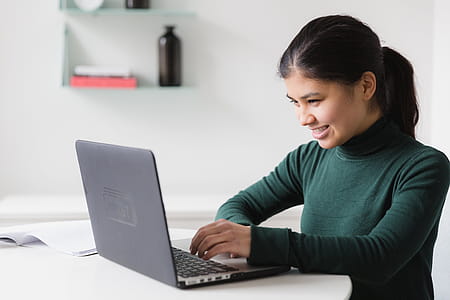 Happy Woman On Computer Photo thumbnail