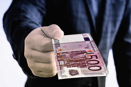 person holding 500 euro banknote thumbnail