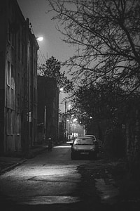 grayscale photography of car parked beside the street thumbnail