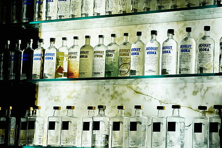 vodka bottle lot on glass-top shelf thumbnail