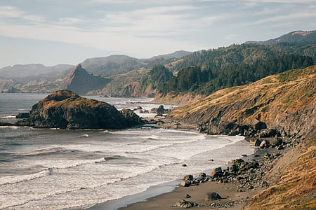ocean waves hitting the foot of the cliffs thumbnail