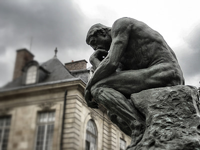 photo of thinking man statue thumbnail
