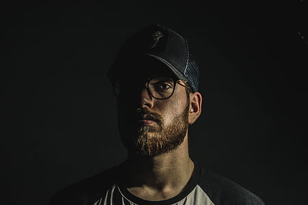 man wearing black cap thumbnail