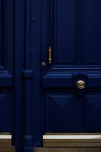 closed blue wooden door thumbnail