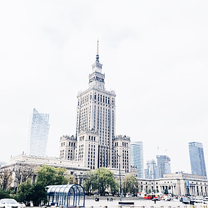 white concrete high-rise building under white sky during daytime thumbnail