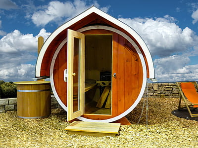 opened brown wooden shed thumbnail