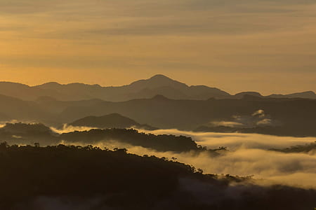 fog covered mountain during golden hour thumbnail
