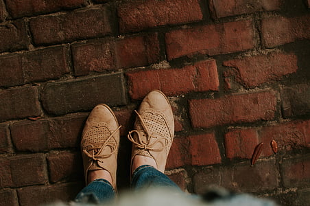 person stepping on brick ground thumbnail