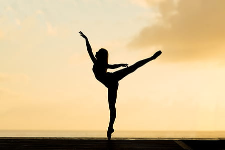 silhouette of woman doing ballet thumbnail