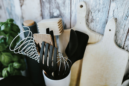 Kitchen utensils and cans by the wall thumbnail