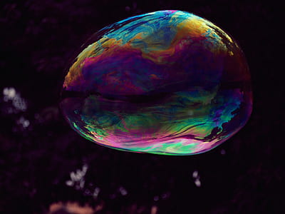 iridescent water blob closeup photo thumbnail