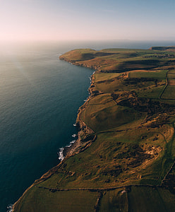 aerial photo of island surrounded by body of water thumbnail