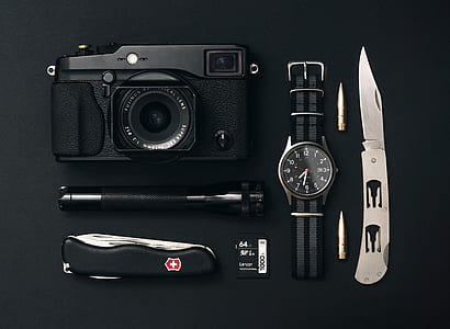 black film camera and folding knife thumbnail
