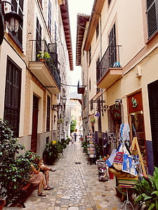 Photo of Concrete Buildings With Little Stores in Between Buildings thumbnail