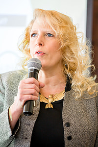 woman holding microphone thumbnail