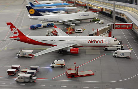 white and red airplane thumbnail