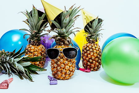 black sunglasses on pineapple thumbnail