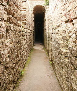 stone tunnel during daytime thumbnail