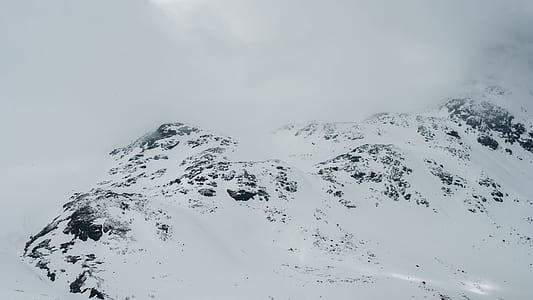 mountain covered snow at daytime thumbnail