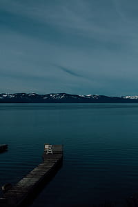 photography of wooden dock facing sea thumbnail