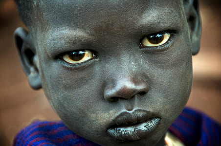 closeup photo of boy's face thumbnail