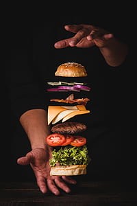 person stacking meat burger thumbnail