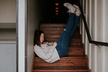 woman laying on wooden stair thumbnail