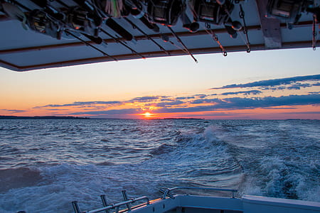 Wide Angle Photo Of Body Of Water During Sunset thumbnail